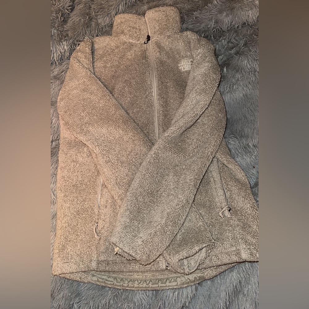 Women’s size medium fuzzy north face zip up